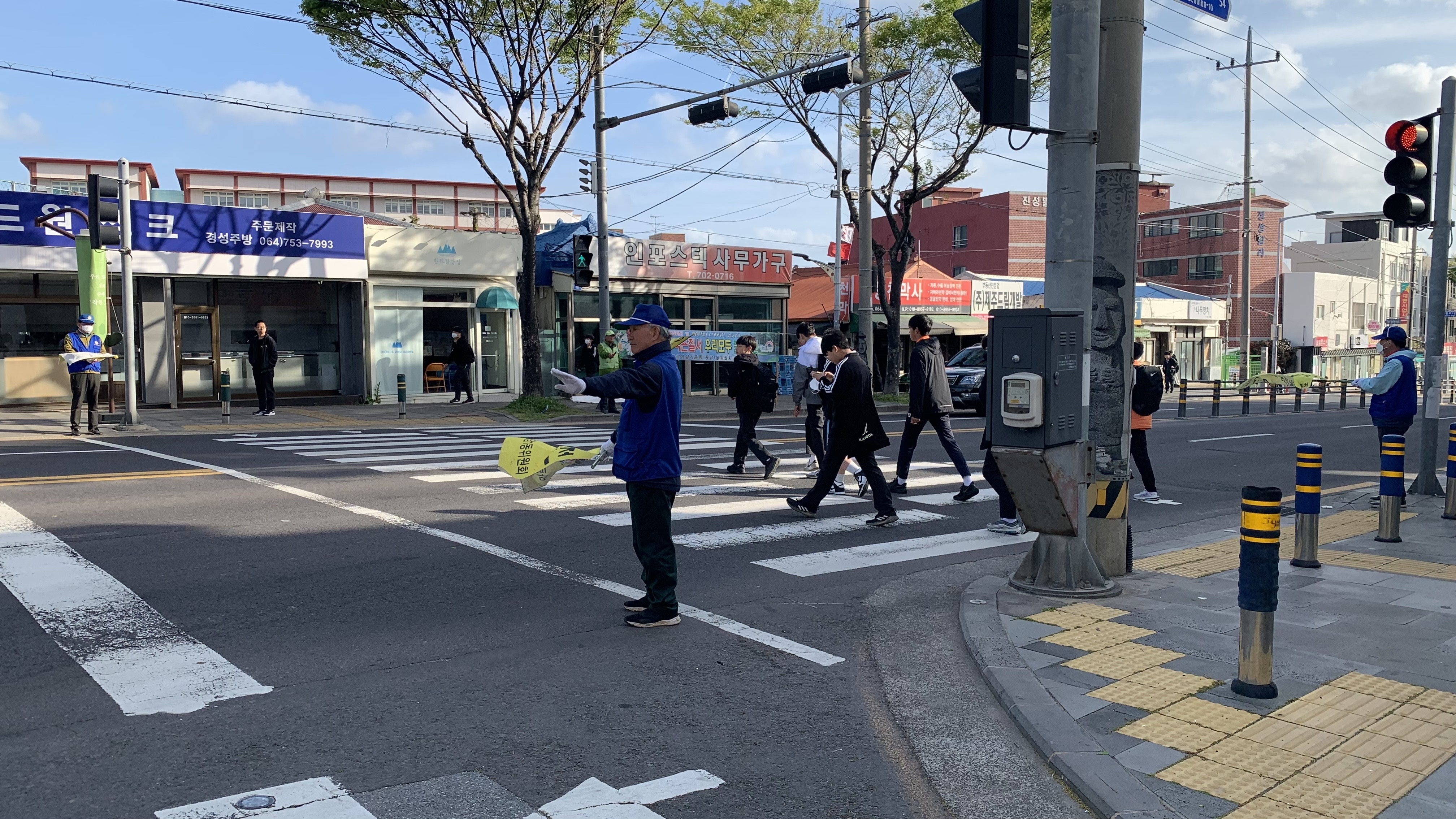 바르게살기운동용담1동위원회, 교통질서 계도 봉사활동 전개 첨부이미지